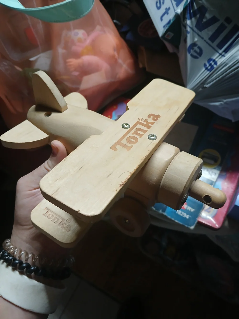 vintage Tonka Wooden Bi-Plane toy, possibly from a 55th Anniversary model kit.